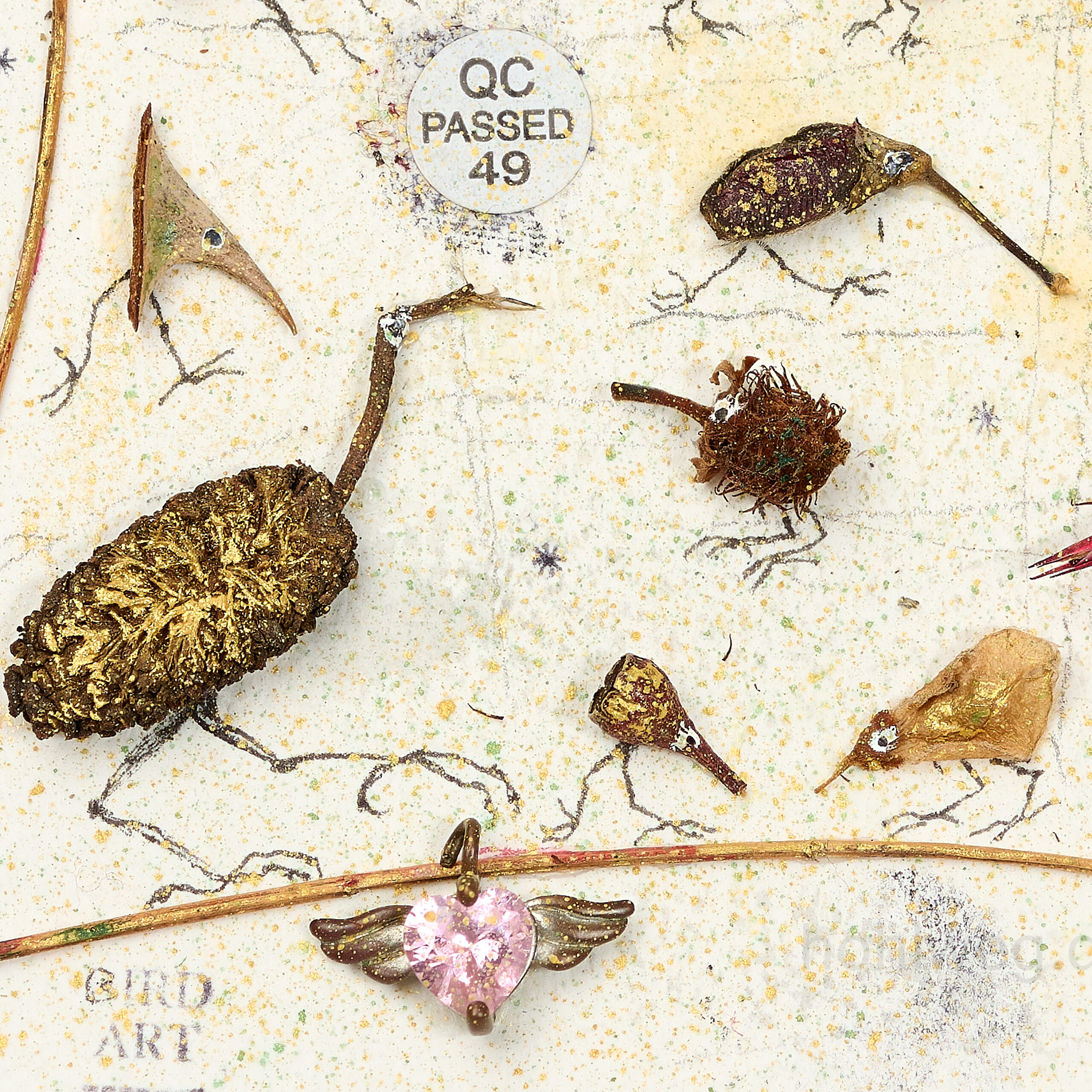 Detail from the assemblage “The Navel of the World,” featuring a fragment of a belly button piercing and plant remains.